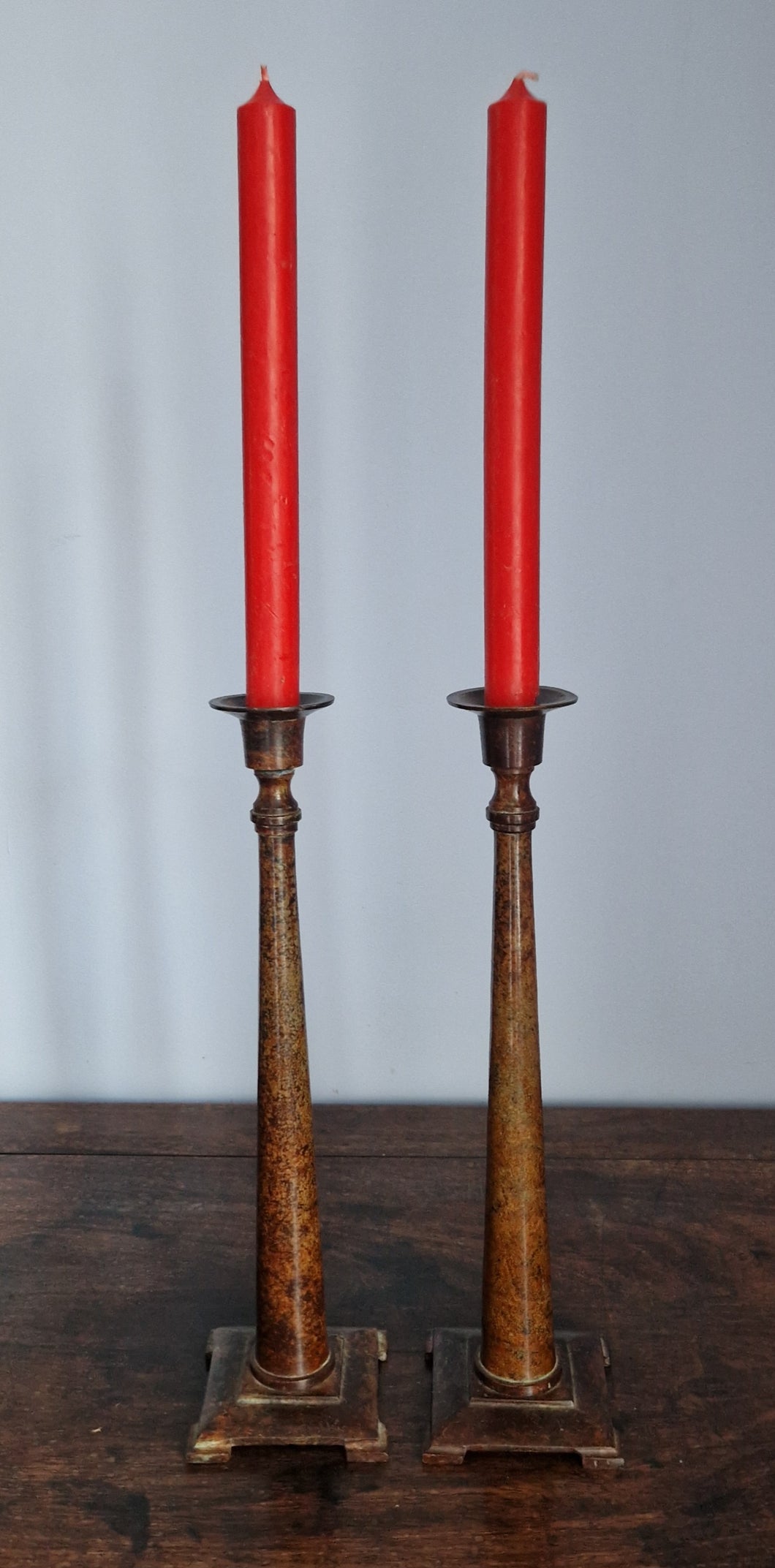 Pair of Patinated Brass Candlesticks